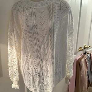 Beautiful white sweater new with tags.